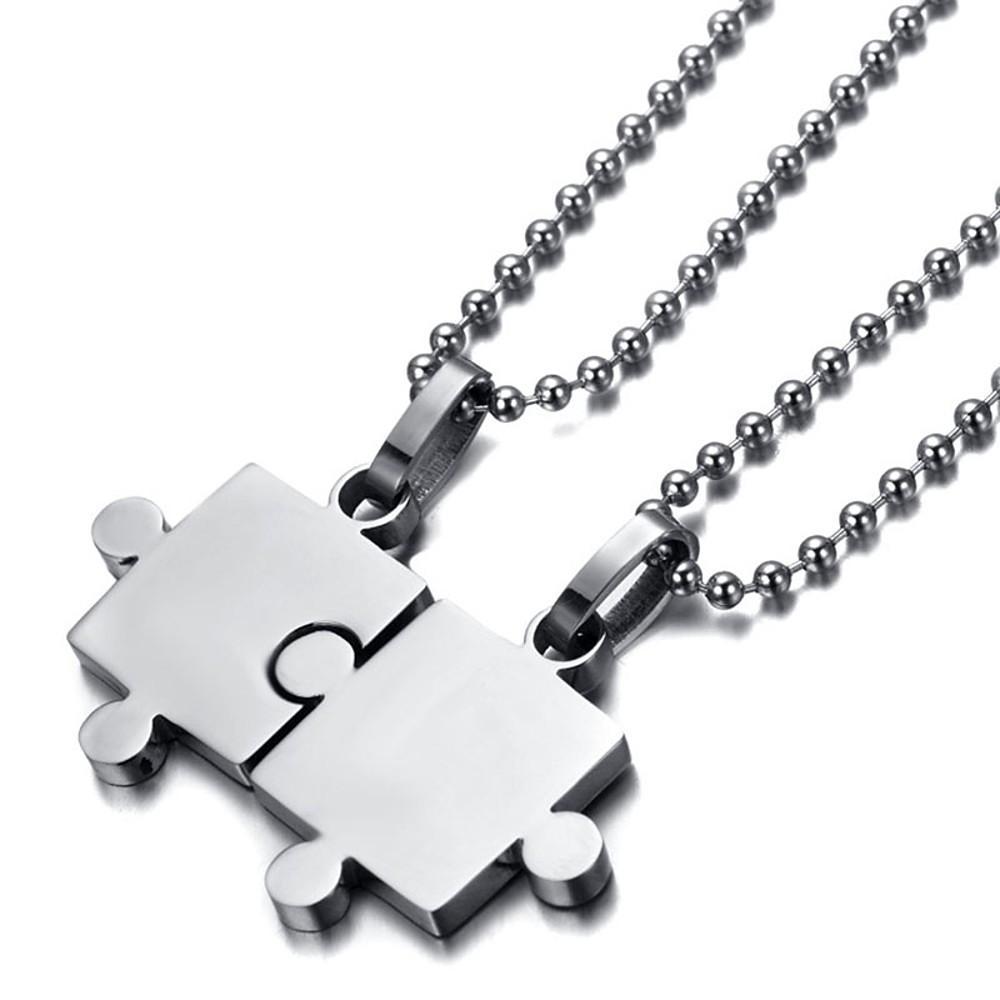 Glossy puzzle couple pendant